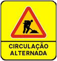 Circulação alternada Quando a circulação nos dois sentidos só se possa fazer alternadamente, os utentes devem ser informados atráves deste sinal. A circulação alternada deve ser regulada por sinalização luminosa ou por operadores utilizando raquetas de sinalização.