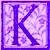 a letra K purpura.jpg